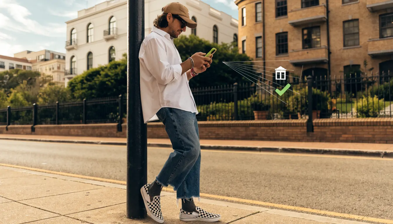Australian using smartphone with PayID confirmation overlay